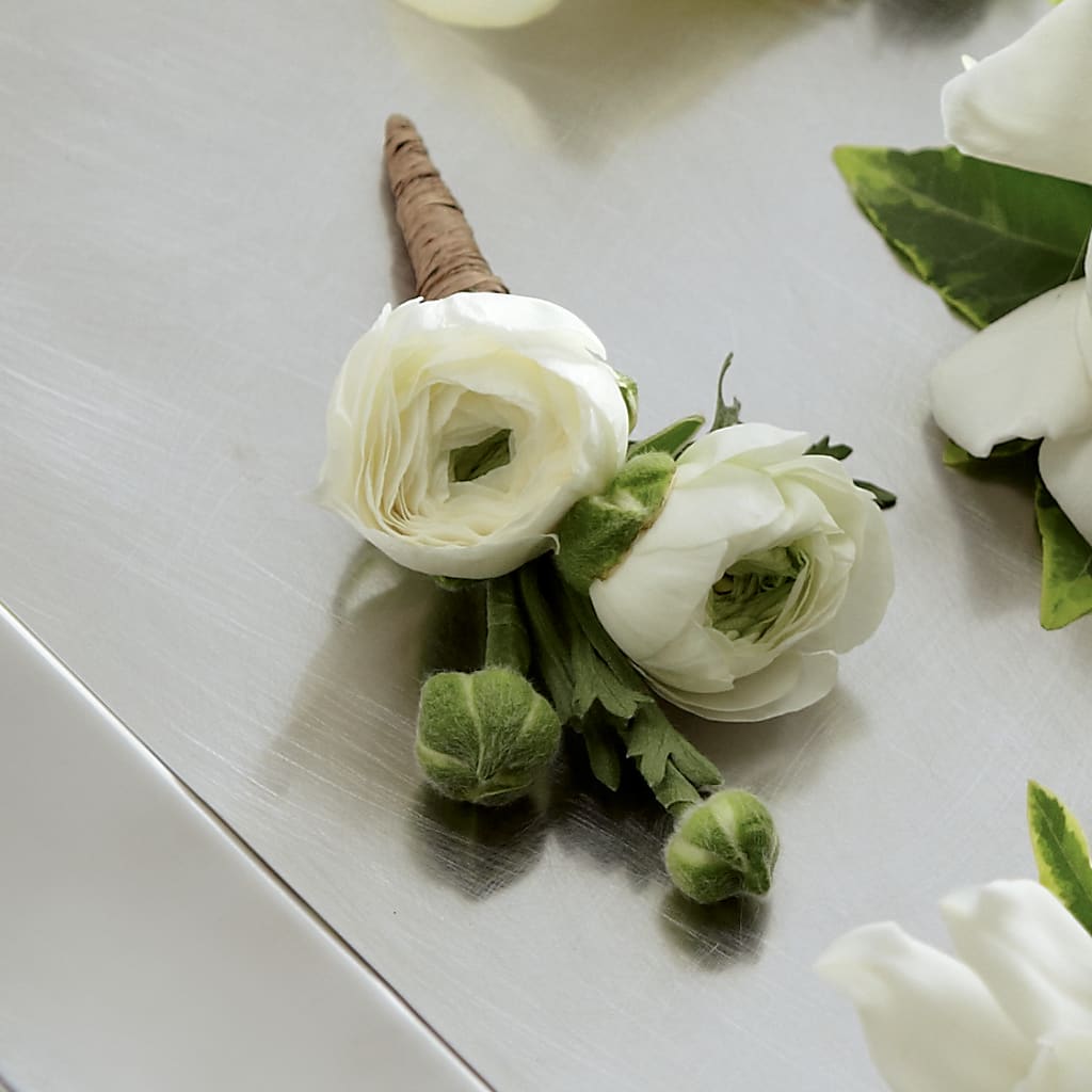 White Ranunculus Boutonniere – Floristeria Fabiana, Charlotte NC